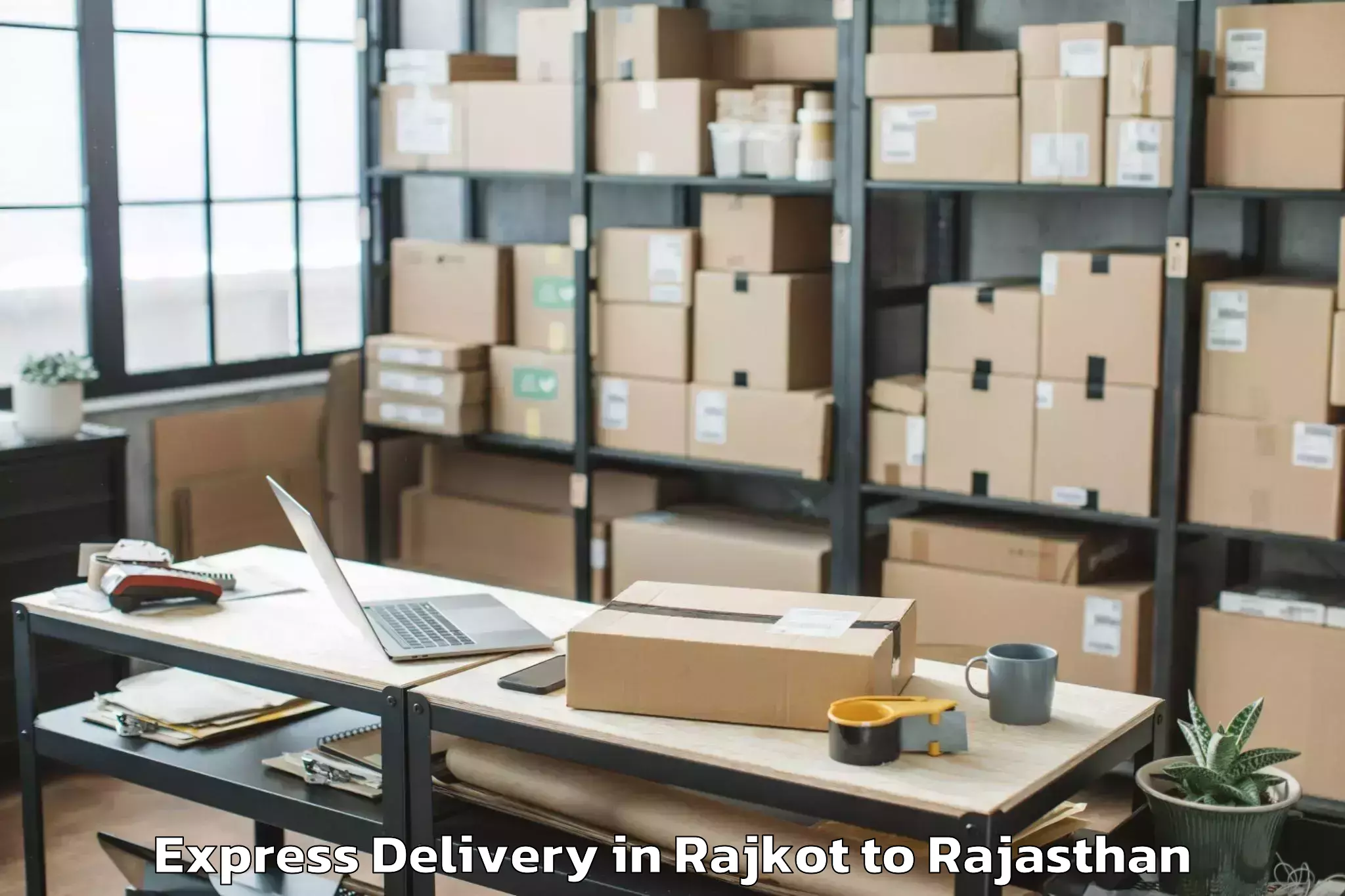 Book Rajkot to Jk Lakshmipat University Jaipu Express Delivery Online